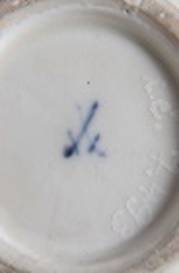 76) 7493
